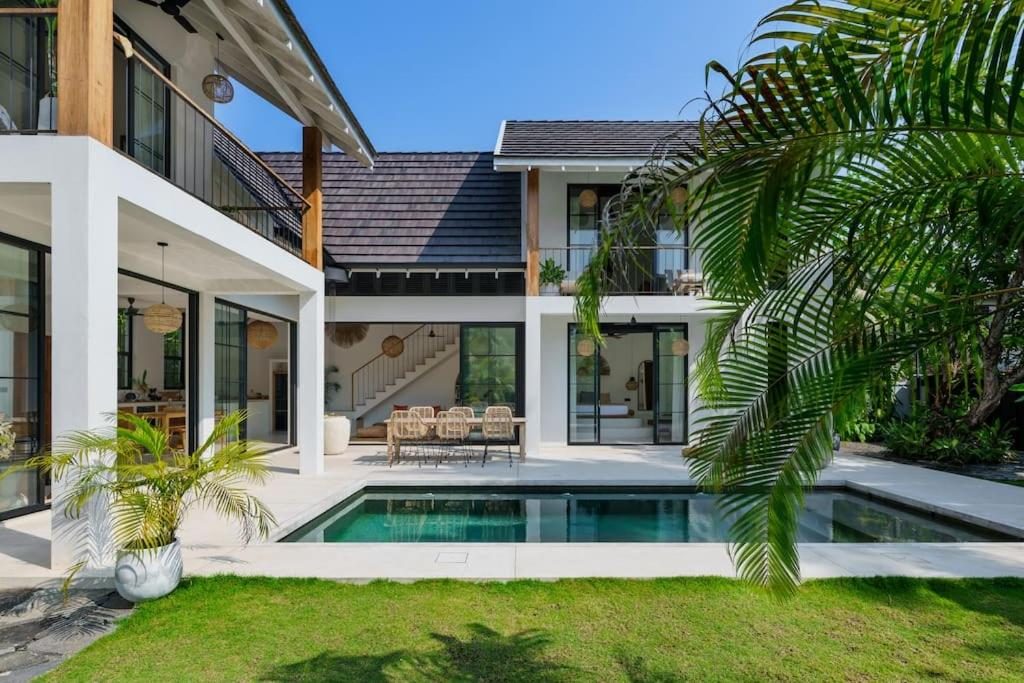 A private villa with a pool and garden